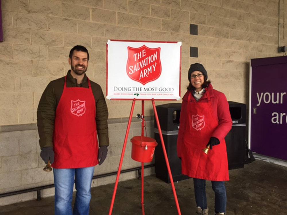 Matt Roberts from Raffa Financial ringing a bell for the Salvation Army